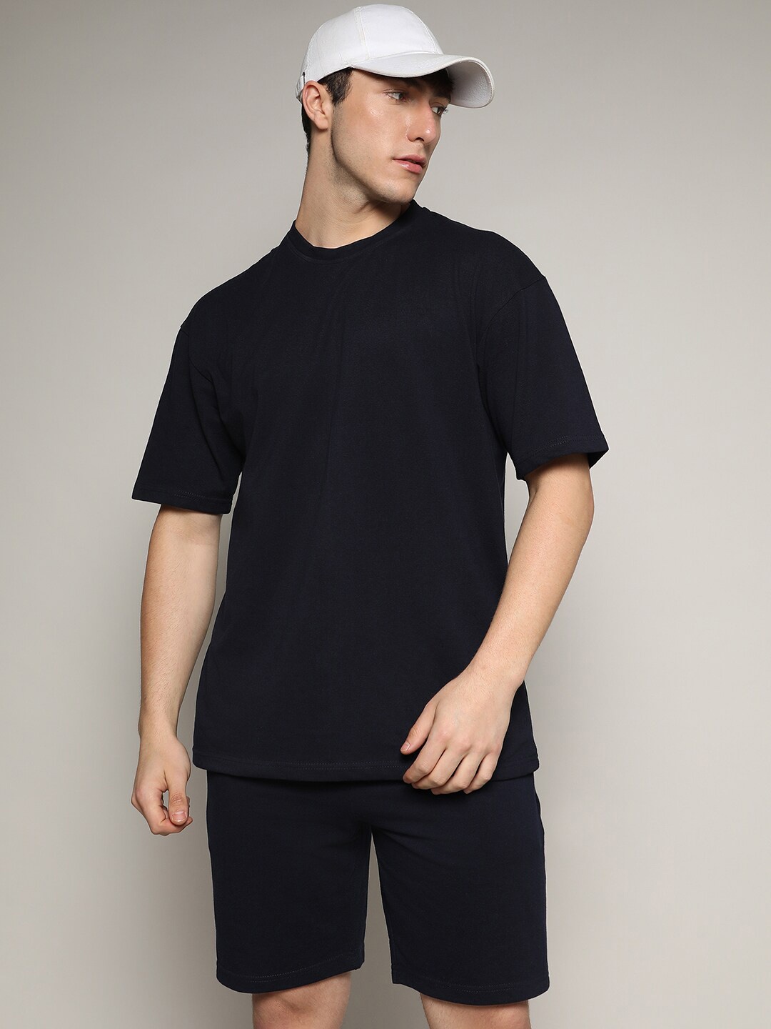 

Campus Sutra Black Pure Cotton Oversized T-shirt & Mid-Rise Shorts