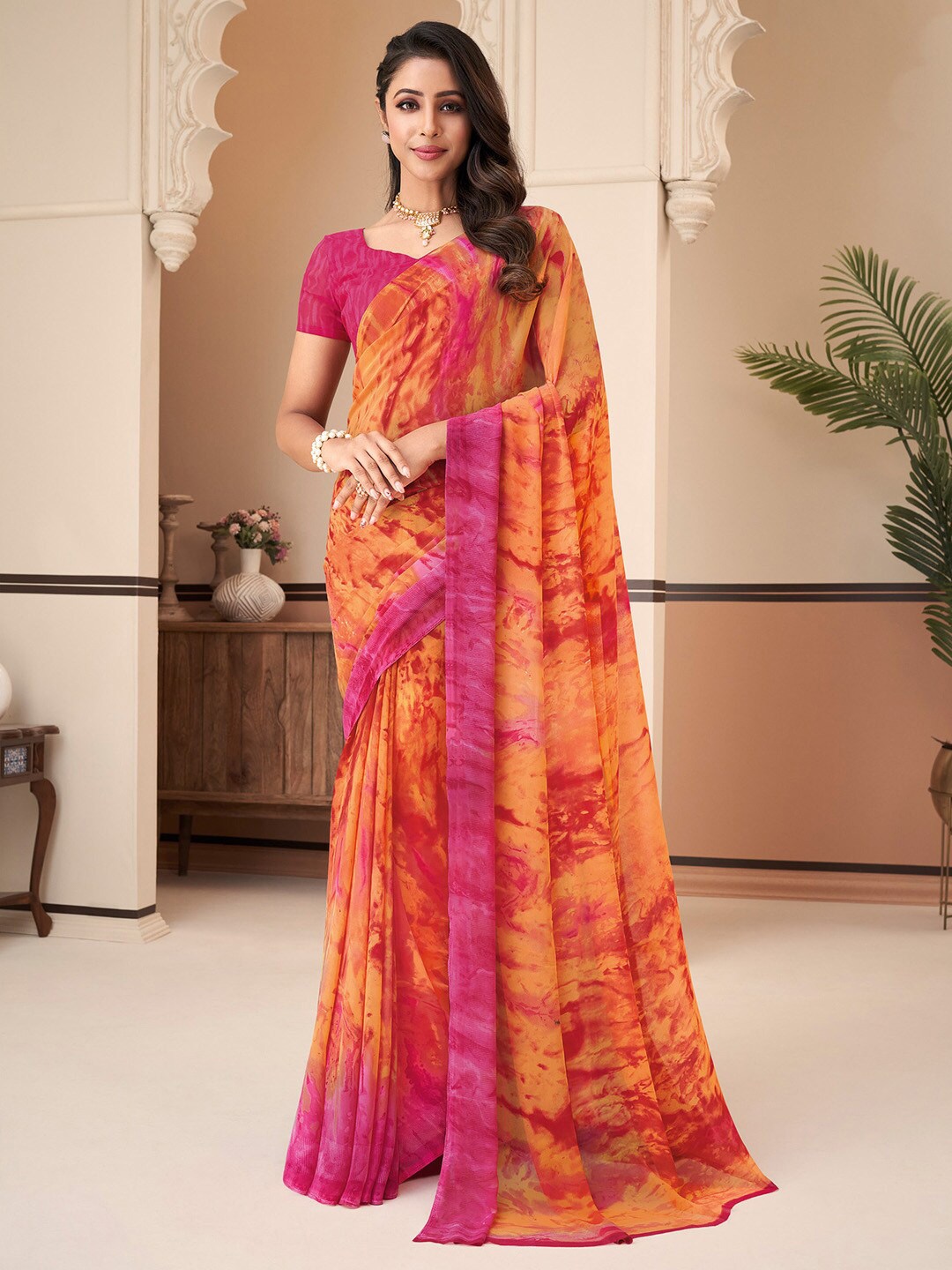 

Anouk Orange Coloured & Pink Printed Pure Georgette Designer Dabu Saree