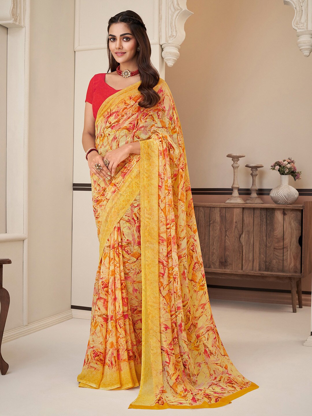 

Anouk Yellow & Red Printed Pure Georgette Designer Dabu Saree