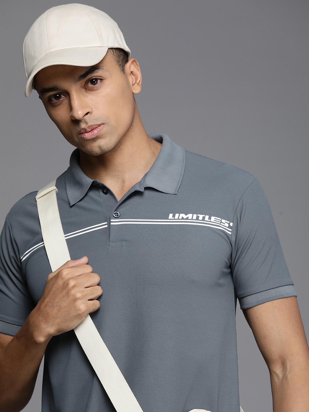 

HRX by Hrithik Roshan Men Striped Polo Collar Rapid-Dry T-shirt, Grey