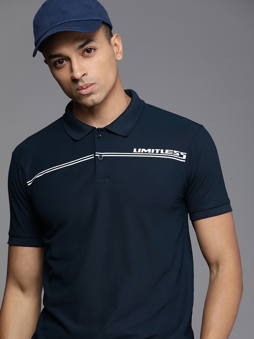 

HRX by Hrithik Roshan Men Striped Polo Collar Rapid-Dry T-shirt, Navy blue