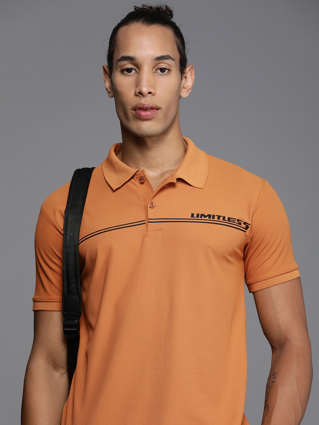 

HRX by Hrithik Roshan Men Striped Polo Collar Rapid-Dry T-shirt, Orange