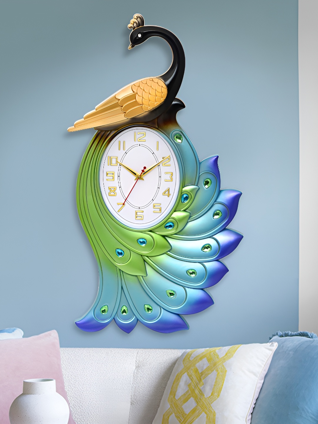 

Attractionz Blue & Black Oval Shaped Peacock Textured Contemporary Analogue Wall Clock