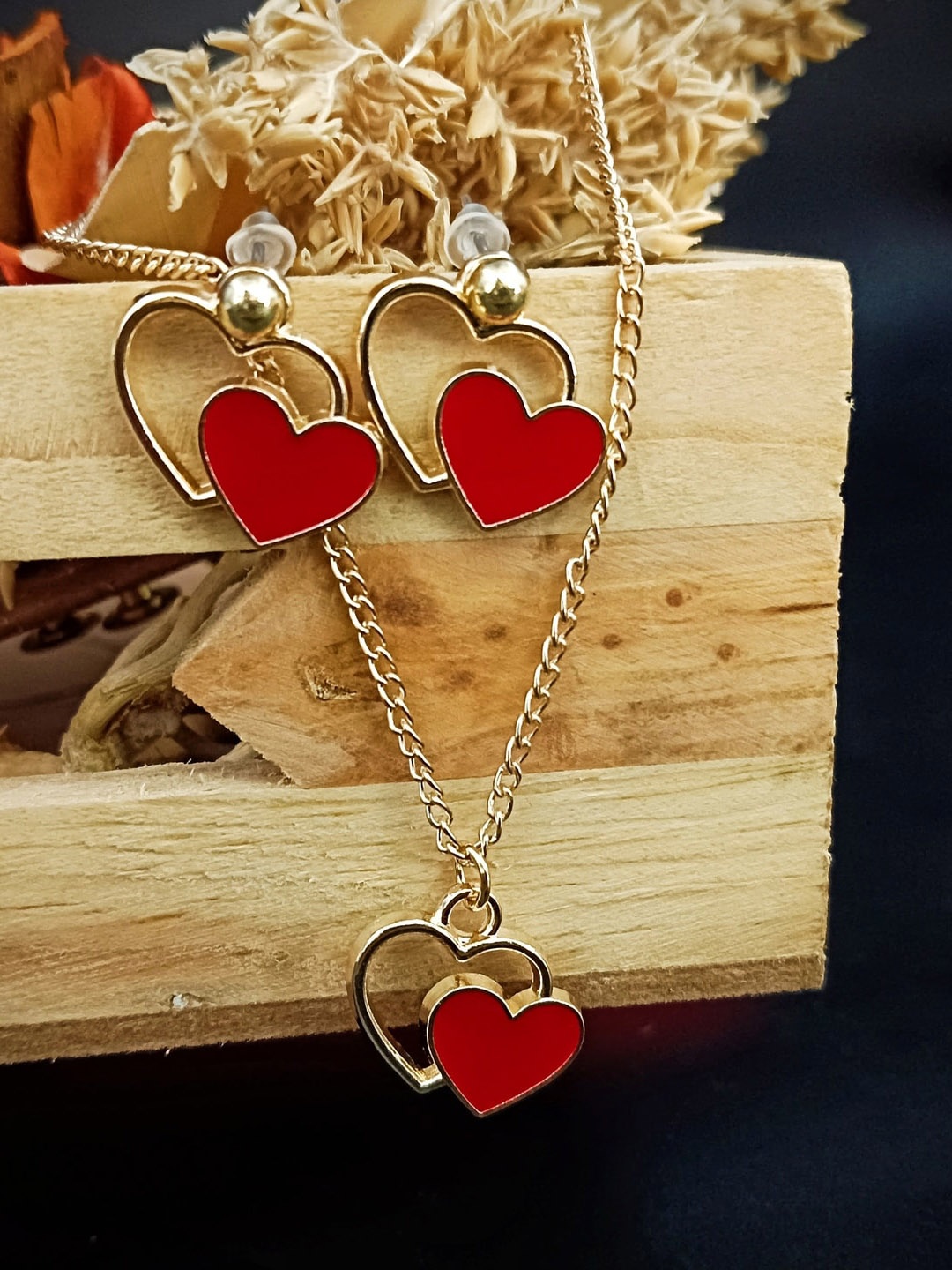 

Manikya Gold Plated Heart Shaped Jewellery Set, Red