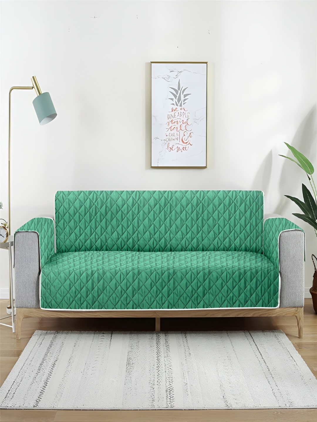 

Aura Brown & Green Reversible Quilted Two Seater Sofa Cover
