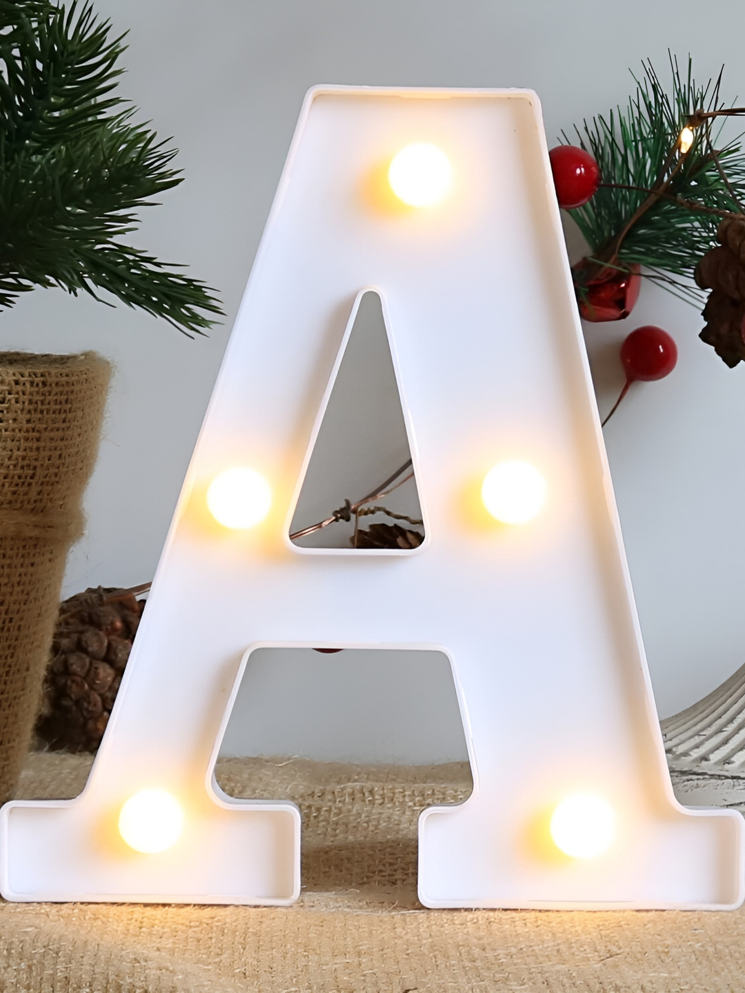 

Satyam Kraft White & Gold Tond Textured Acrylic Contemporary Alphabet Shaped Table Lamp