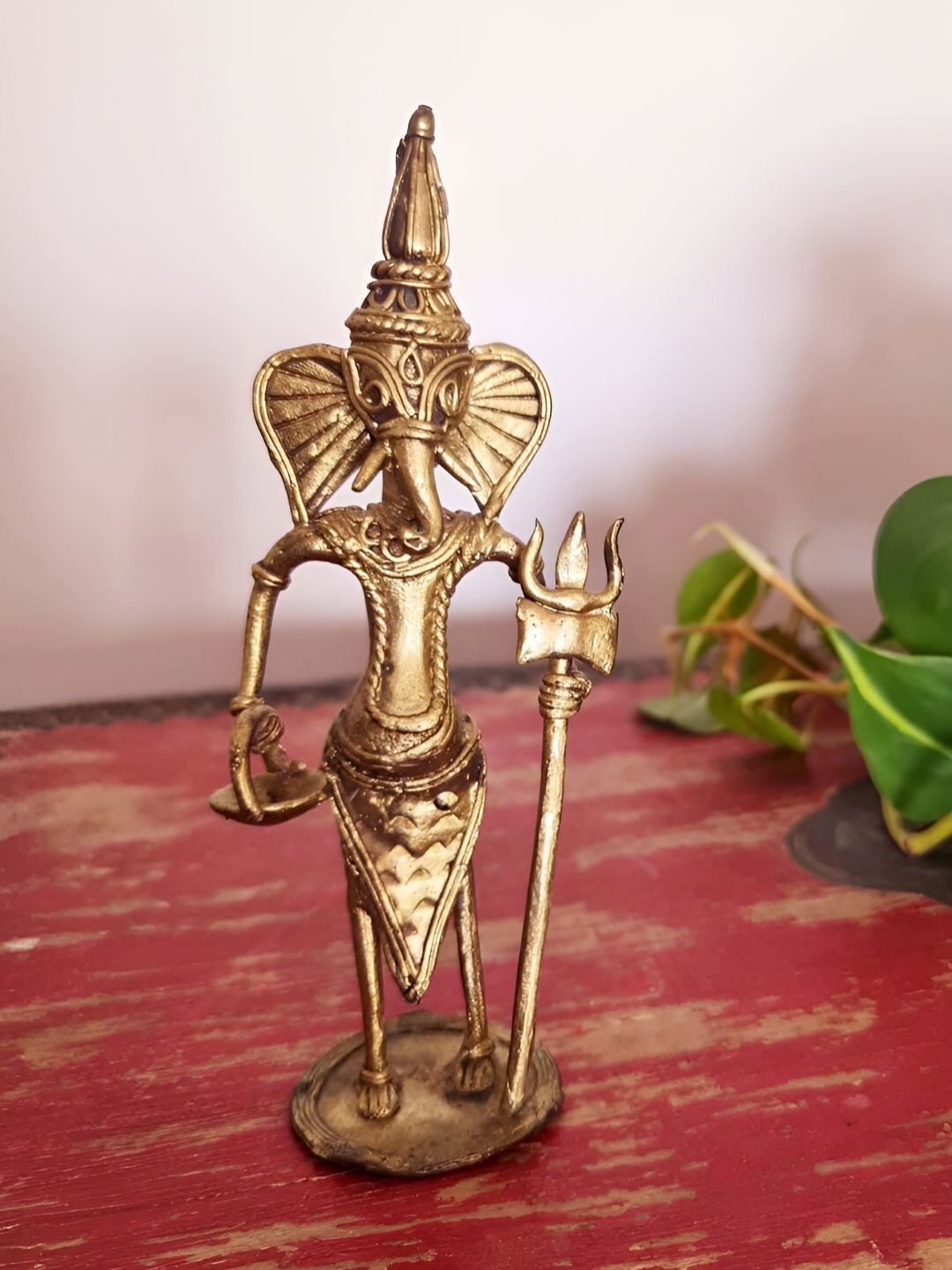 

Peepul Tree Gold Toned Religious Figurine Showpiece