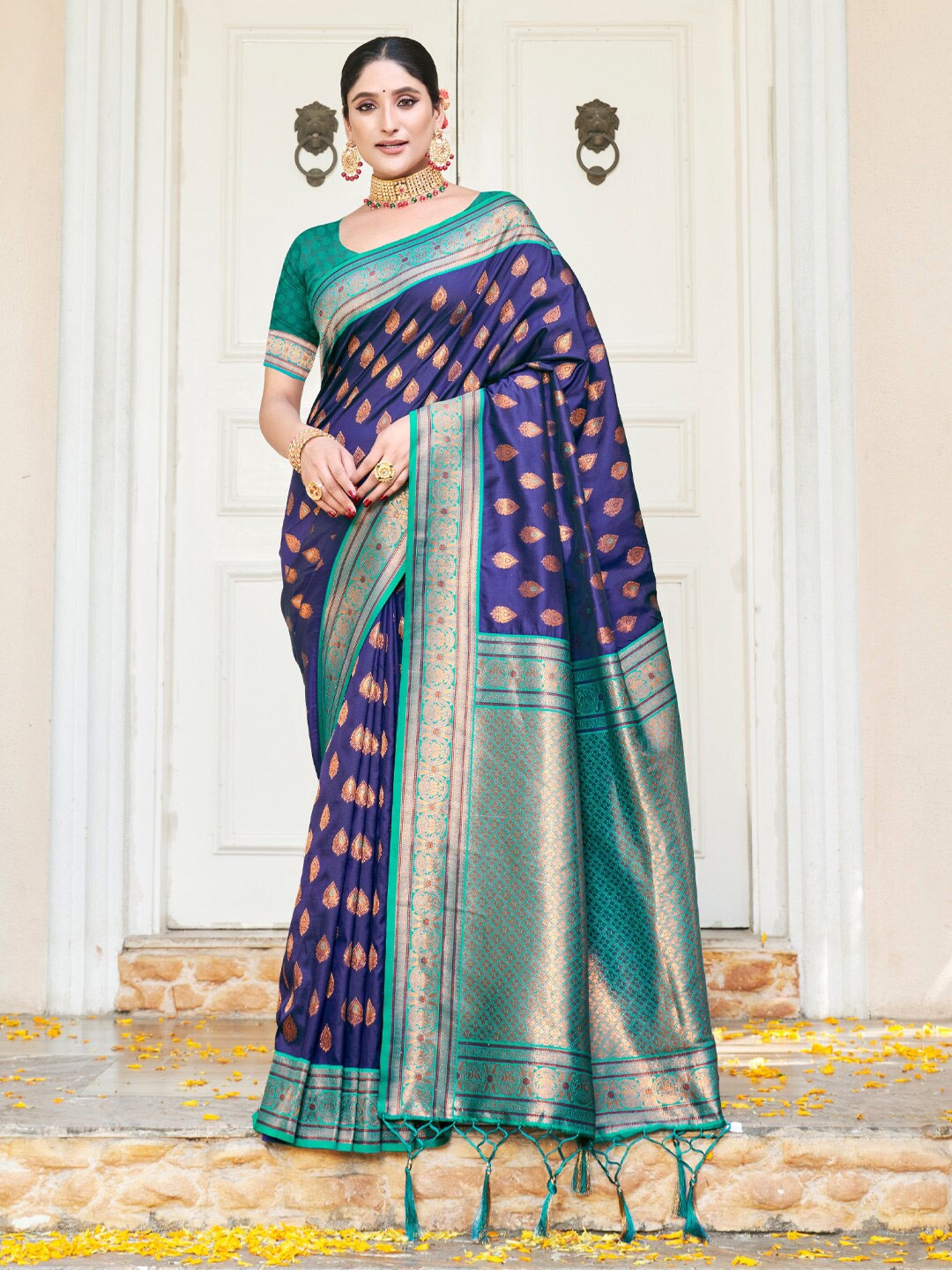 

Mitera Blue Ethnic Motifs Woven Design Zari Saree