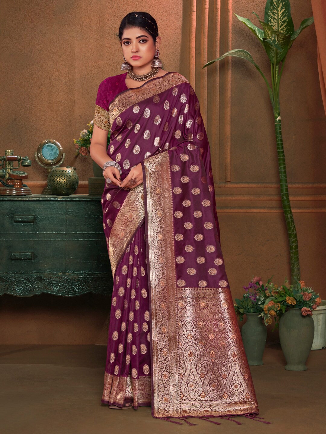 

Mitera Purple Ethnic Motifs Woven Design Zari Saree