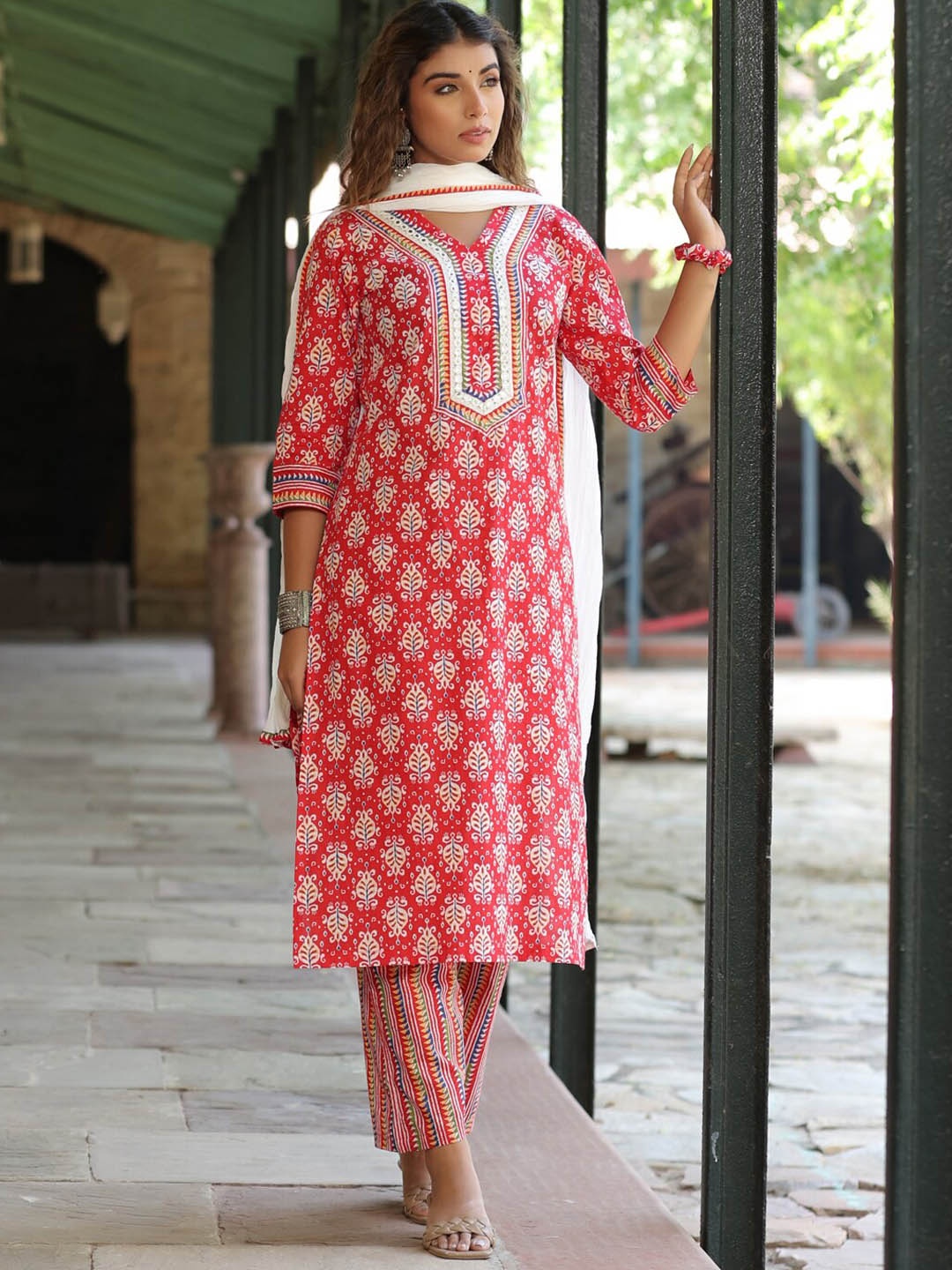 

Rain & Rainbow Ethnic Motifs Printed V-Neck Mirror Work Pure Cotton Kurta Set, Red