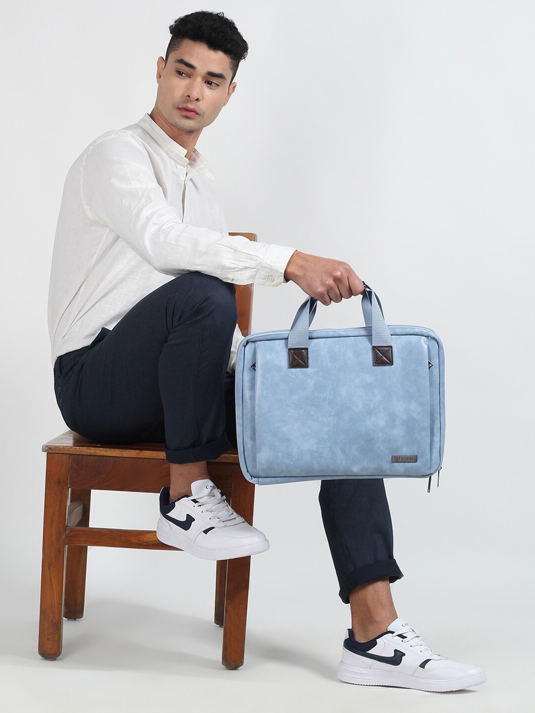 

VISMIINTREND Unisex Blue Solid PU Leather Laptop Bag upto 16 Inch