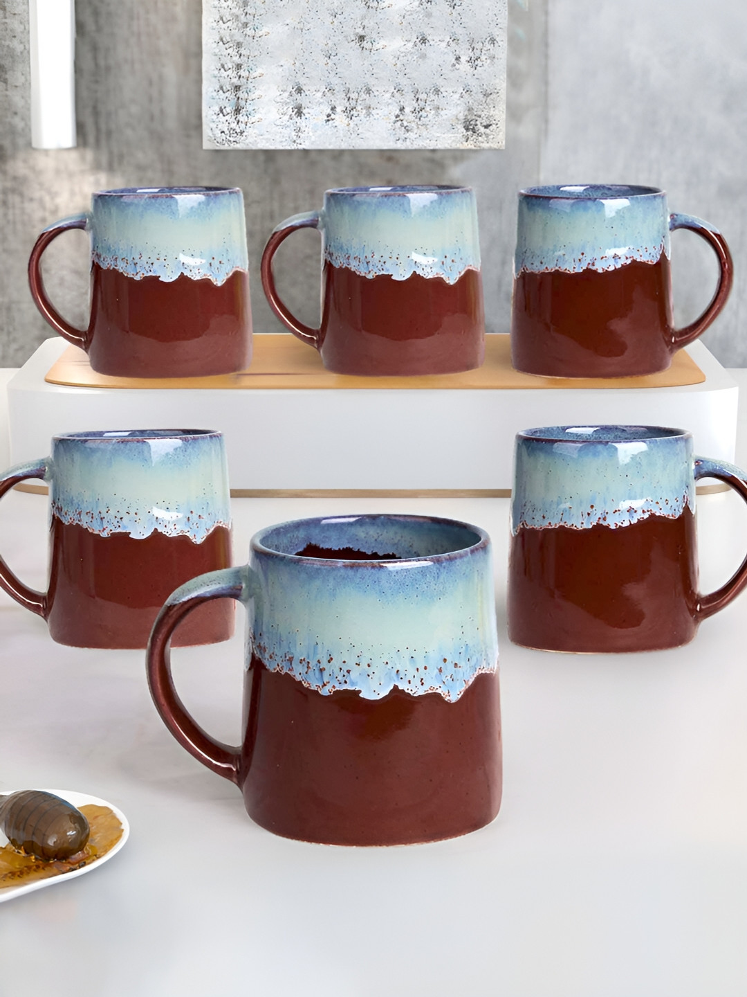 

The Earth Store Mystic Dual Tone 6 Pieces Maroon Printed Ceramic Mugs Set 330 ml Each