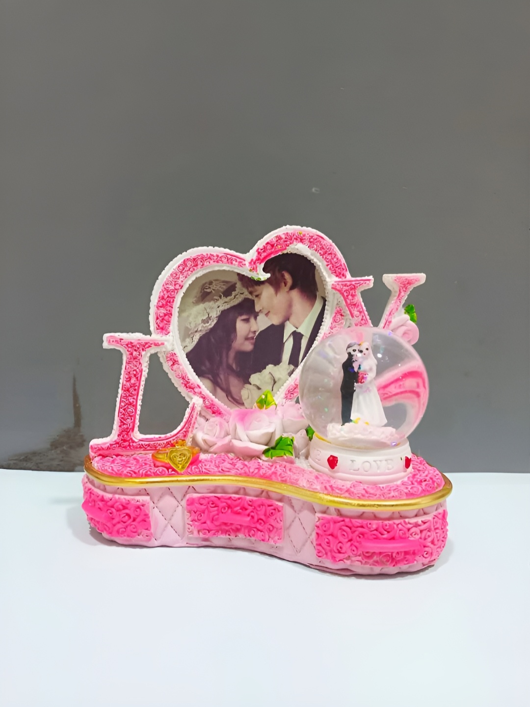 

CraftVatika Pink and Green Small Figurine Showpiece