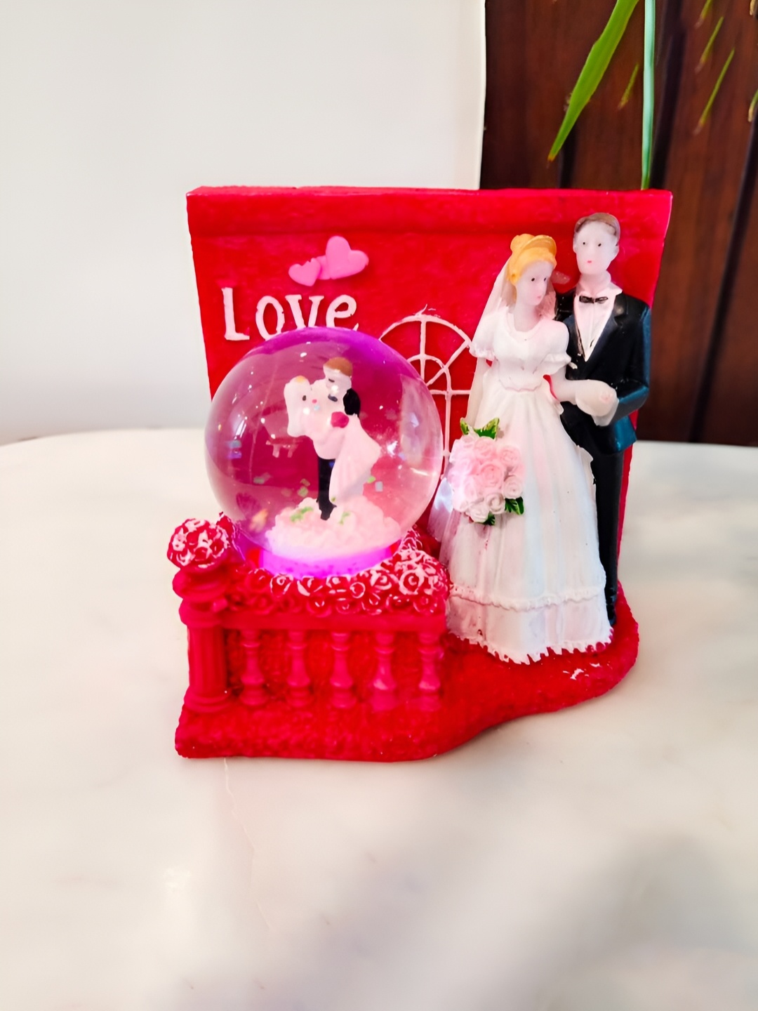 

CraftVatika Red and Cream Small Figurine Showpiece