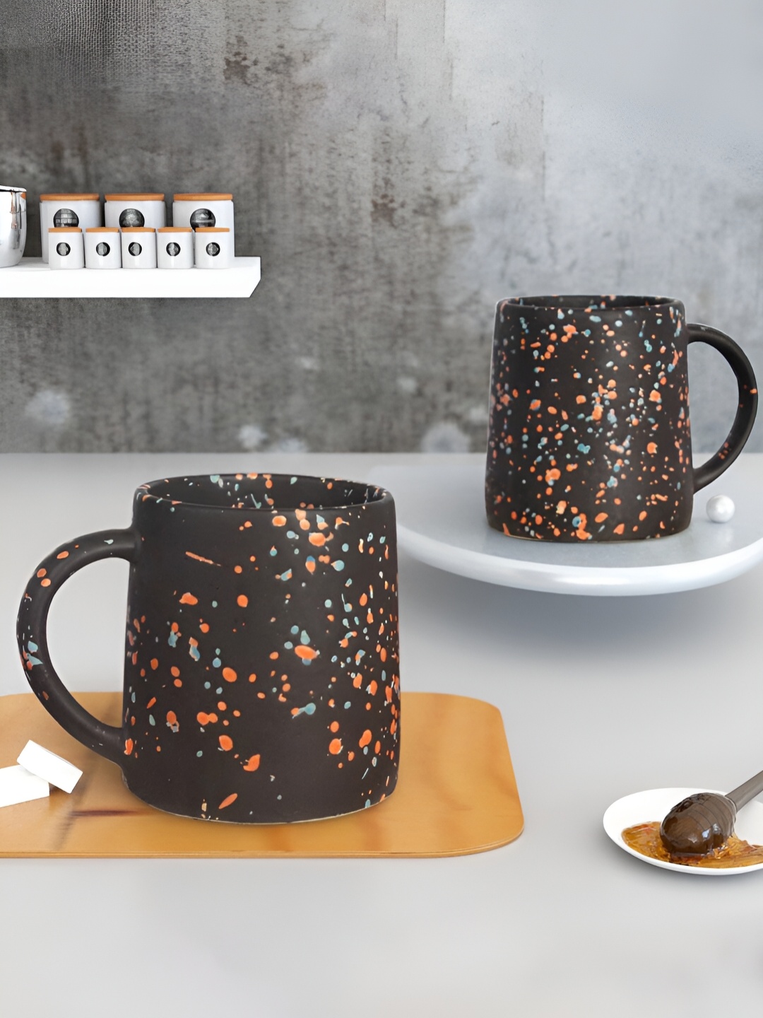 

The Earth Store Black & Orange 2 Pcs Handcrafted Textured Ceramic Matte Mugs 320 ml