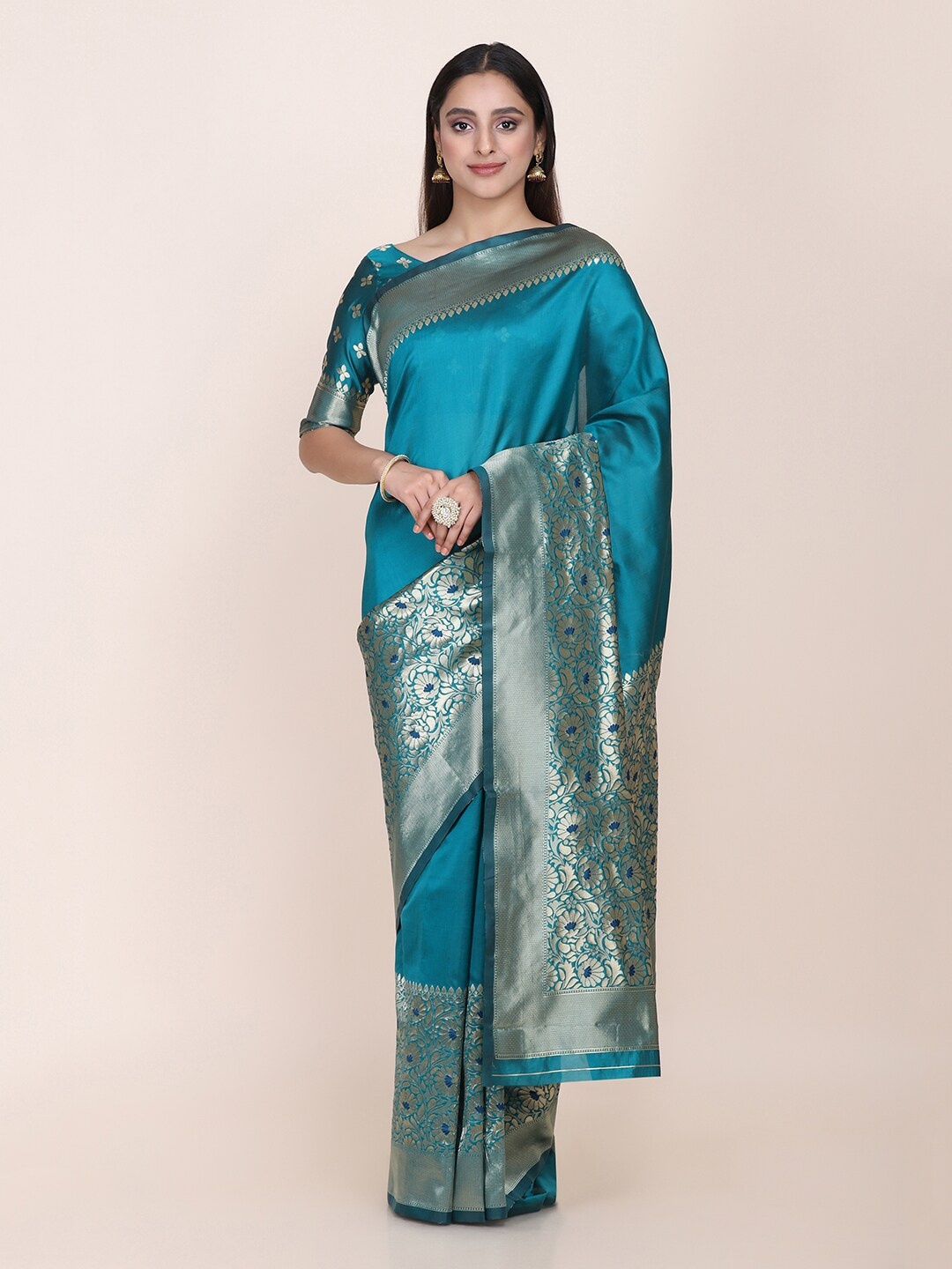 

Shaily Teal Blue Woven Design Zari Saree