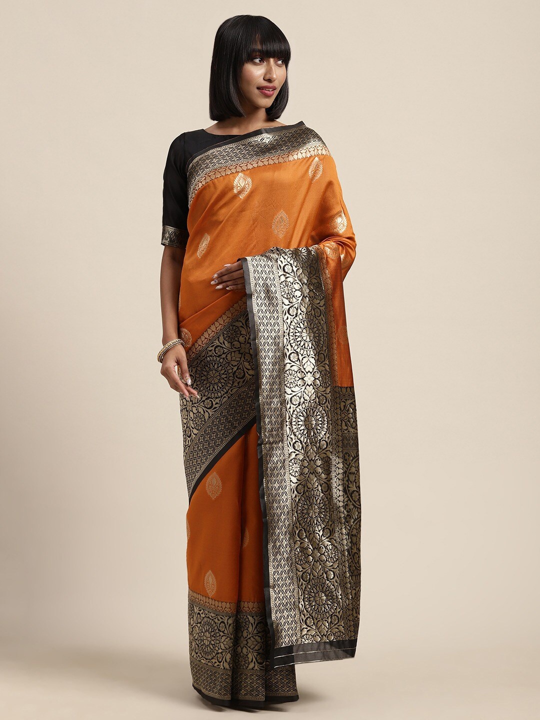 

Shaily Mustard Ethnic Motifs Woven Design Zari Saree