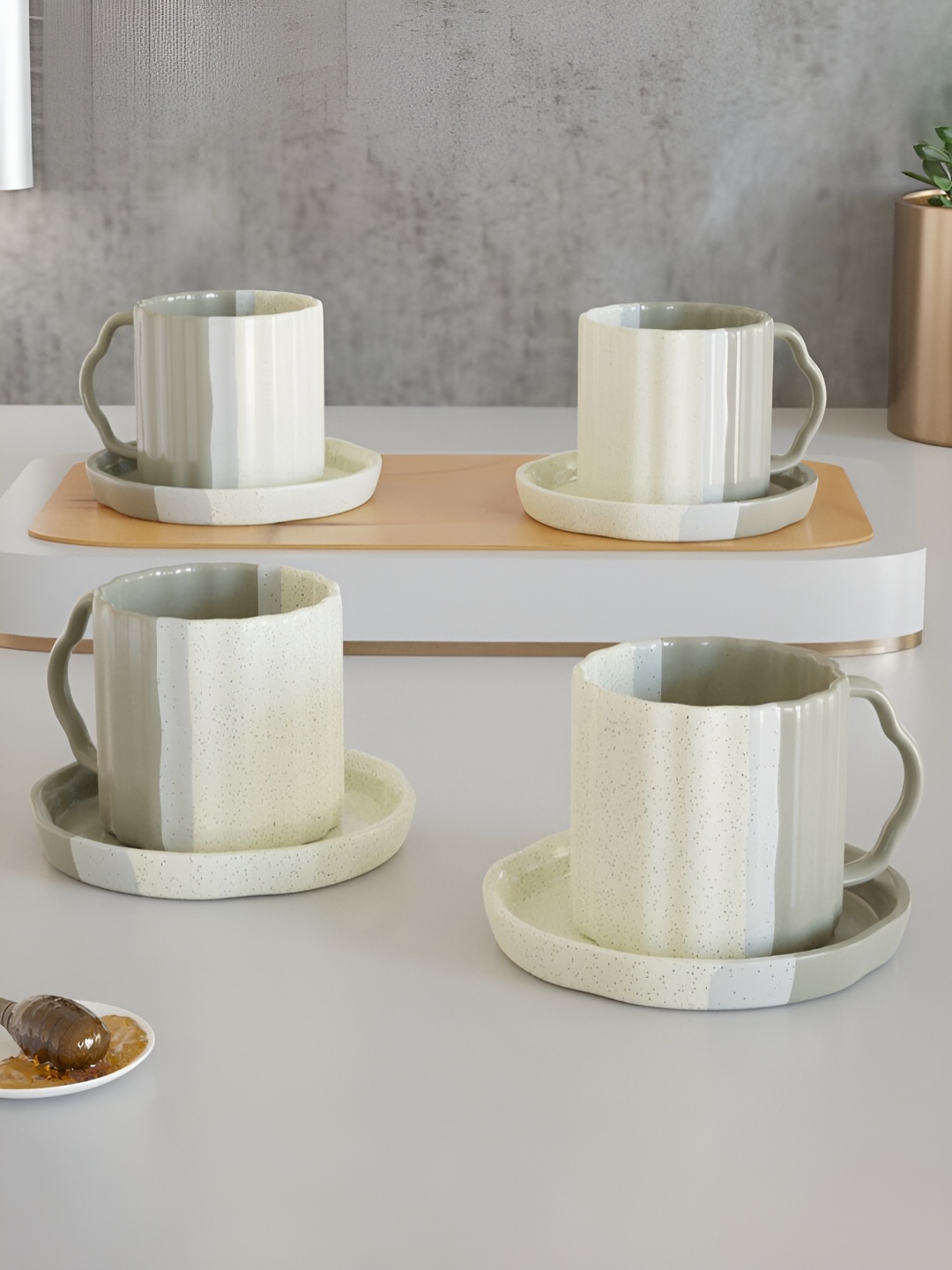 

The Earth Store Grey & White 4 Pcs Textured Ceramic Matte Cups and Saucers Set 180 ml
