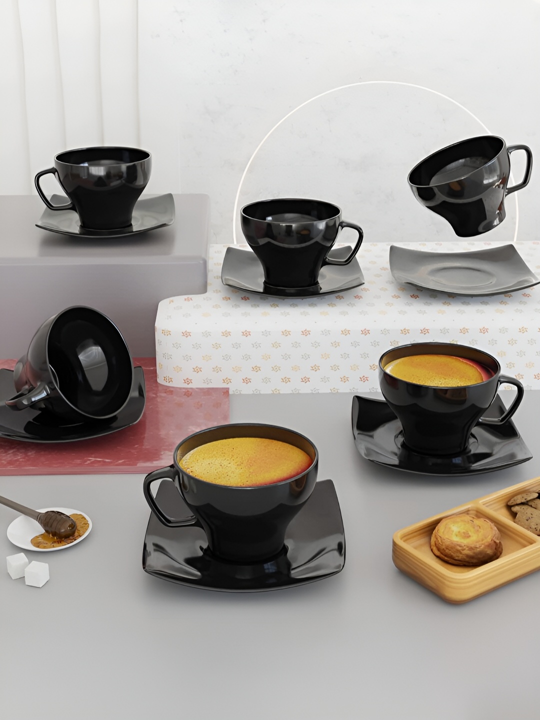 

The Earth Store Black 6 Pcs Handcrafted Ceramic Glossy Cups and Saucers Set 130 ml