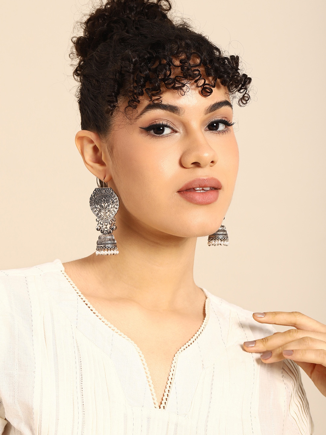

Sangria Silver-Plated Teardrop Shaped Drop Earrings