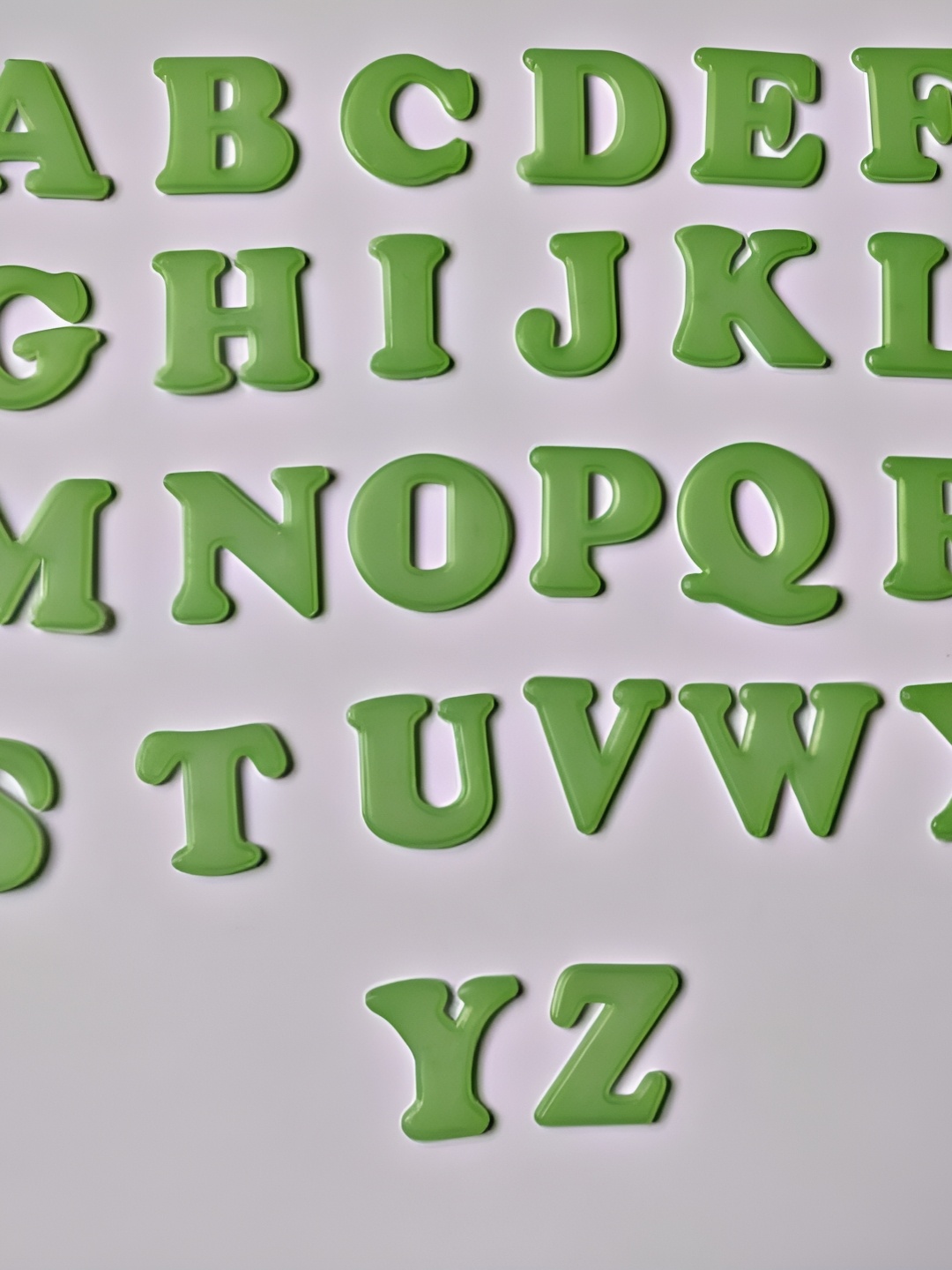 

Aquire Green Alphabets Printed Self Adhesive Wallpaper