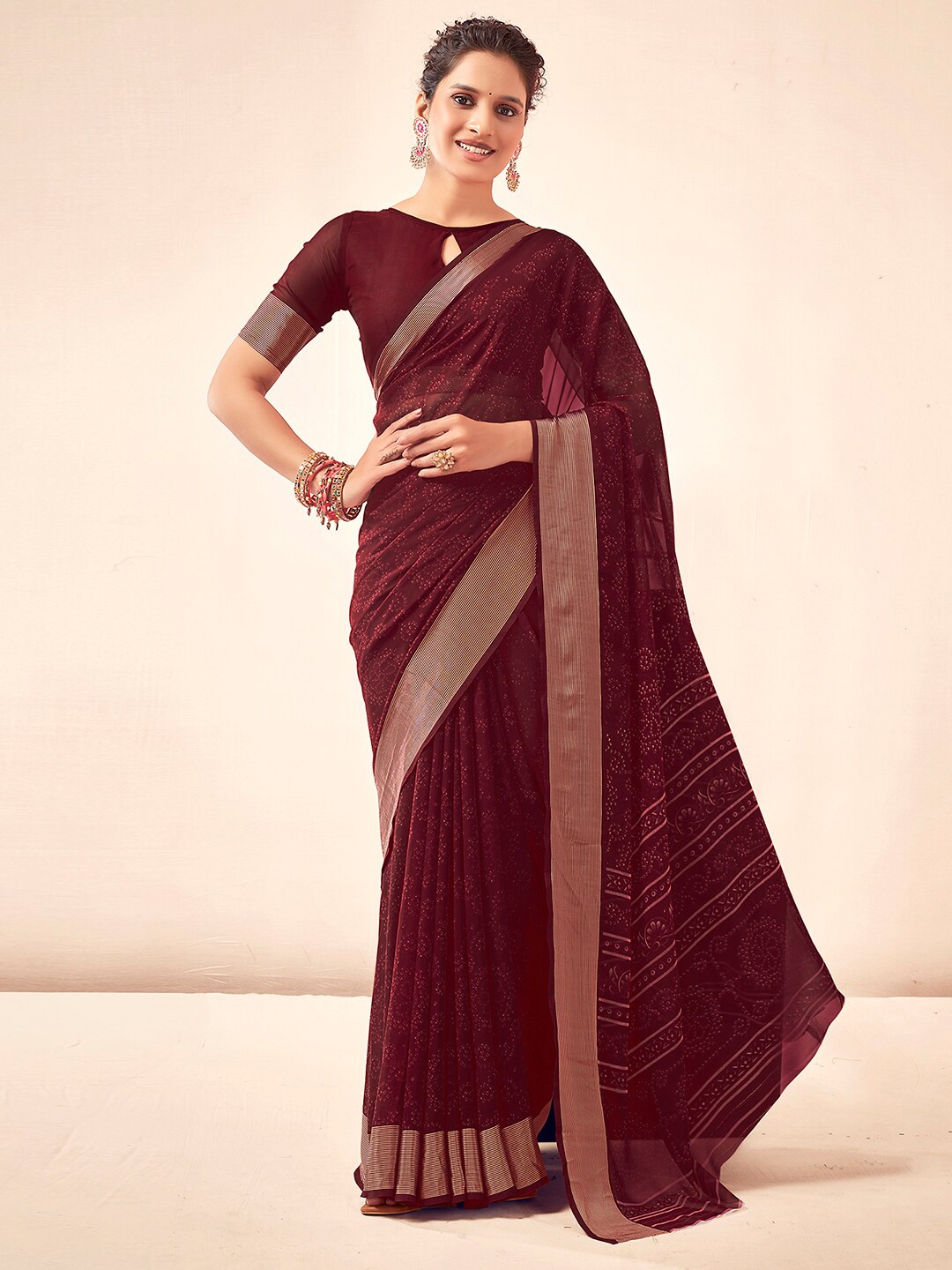 

Mitera Maroon Printed Zari Bandhani Saree