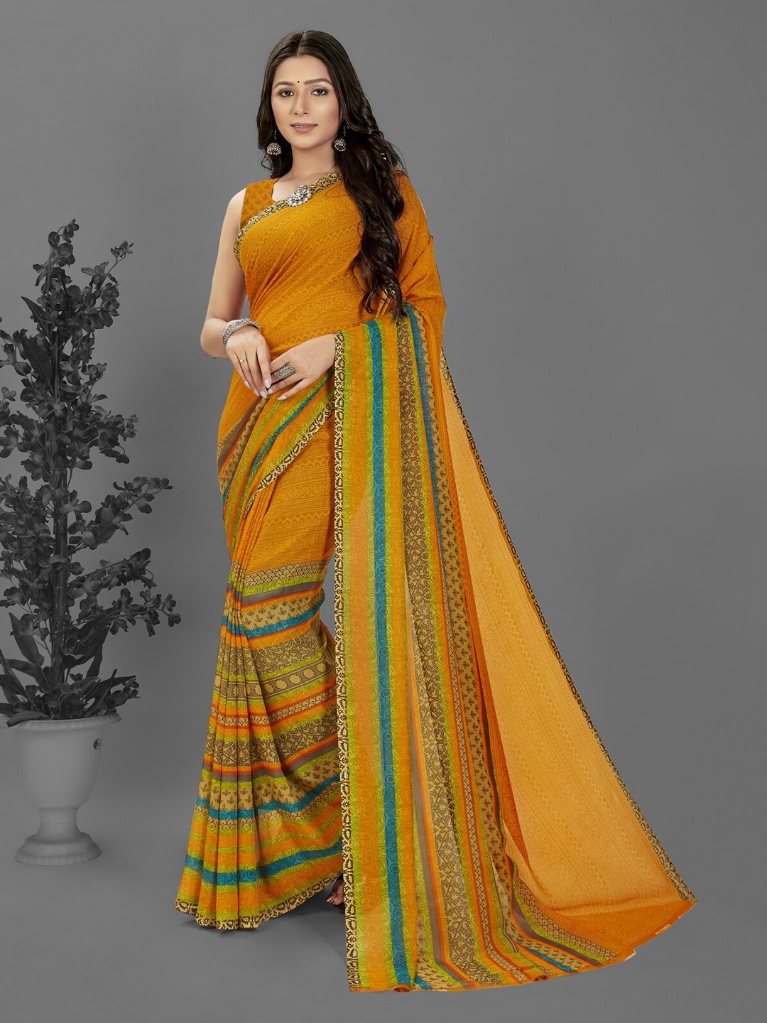 

Moda Rapido Ethnic Motifs Printed Saree, Yellow