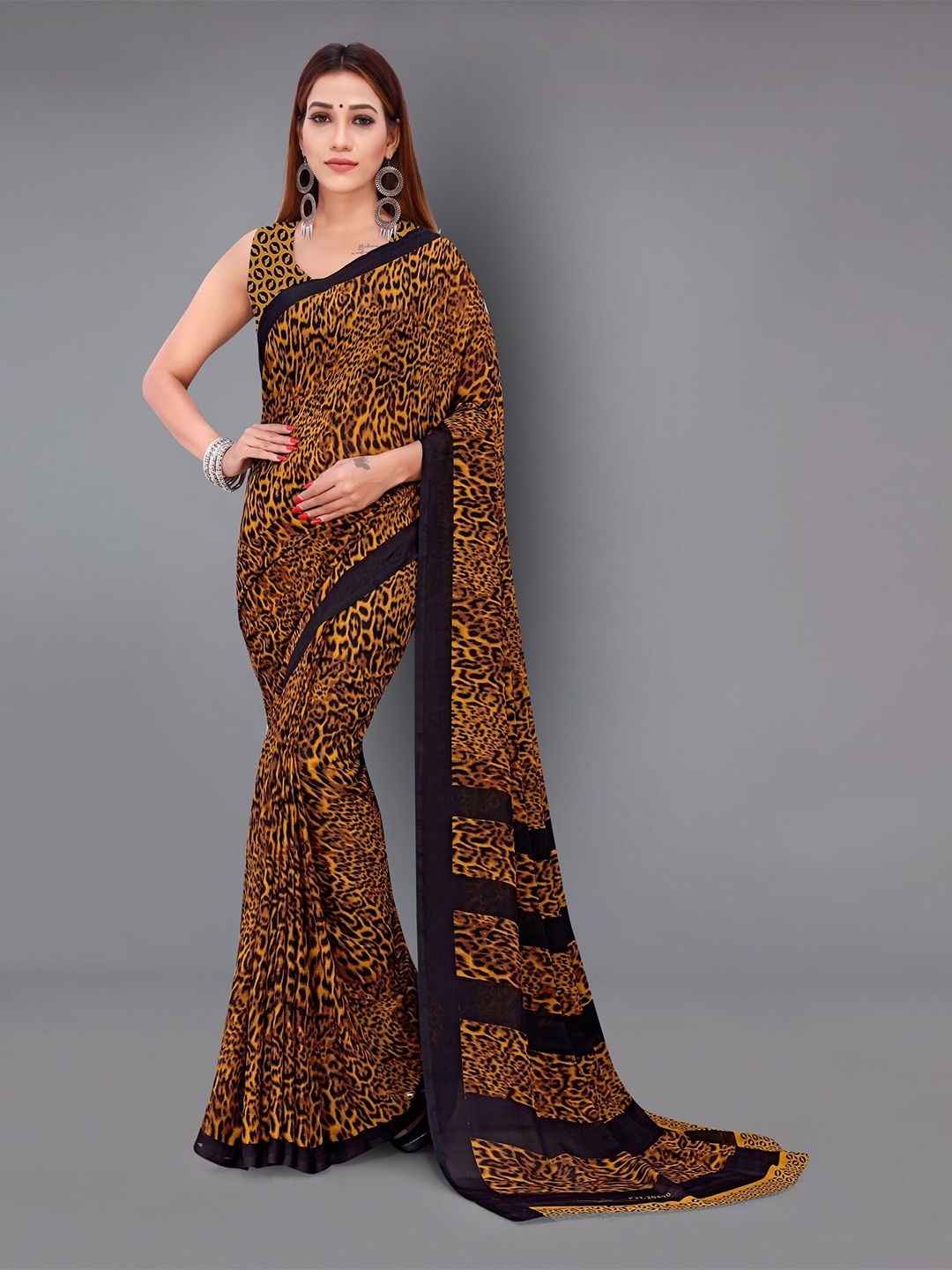 

Moda Rapido Abstract Printed Saree, Mustard