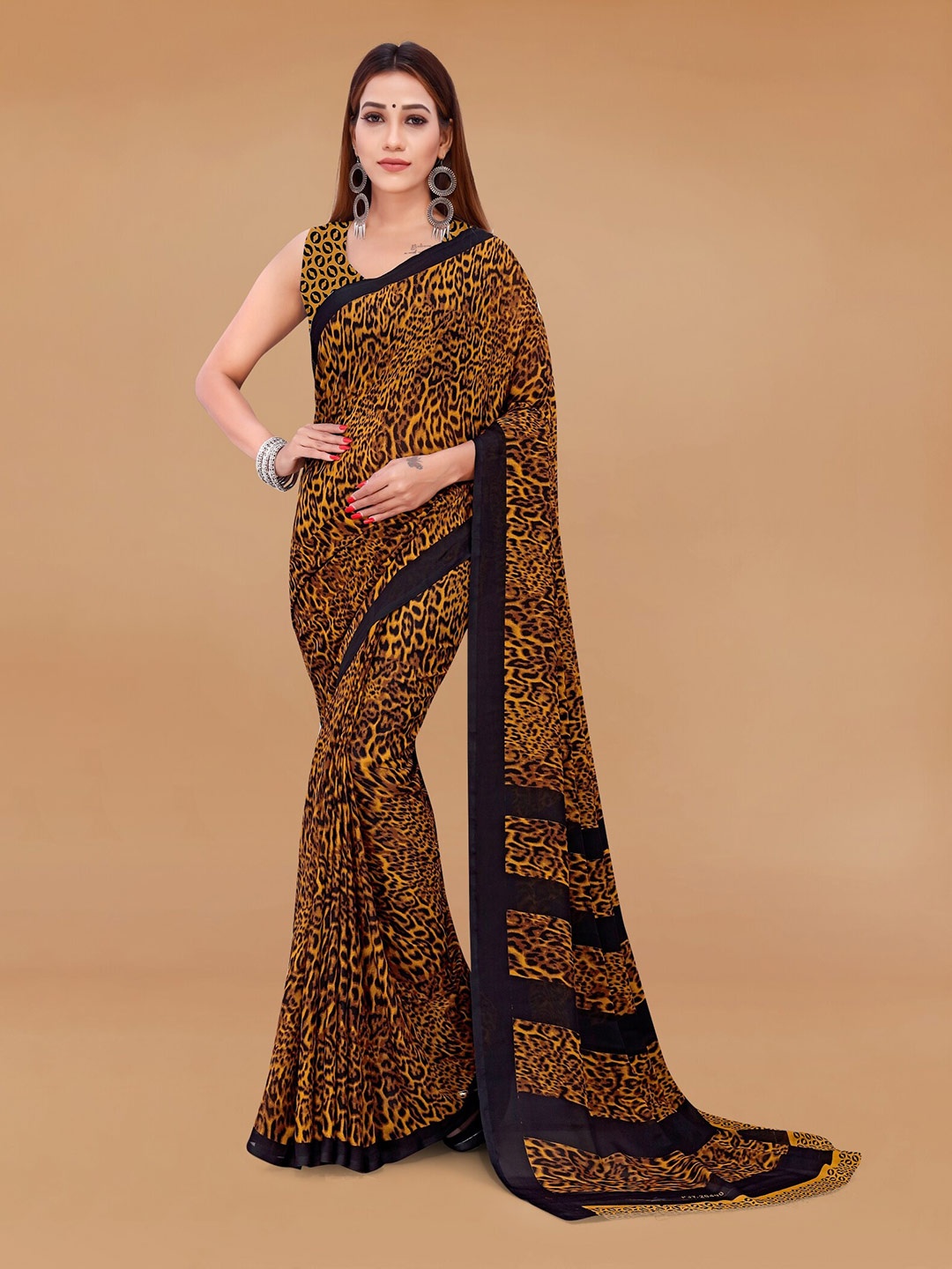 

Moda Rapido Geometric Printed Saree, Mustard