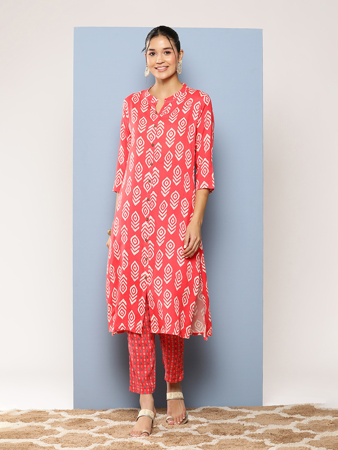 

Aarika Women Printed Regular Pure Cotton Kurta with Trousers, Red