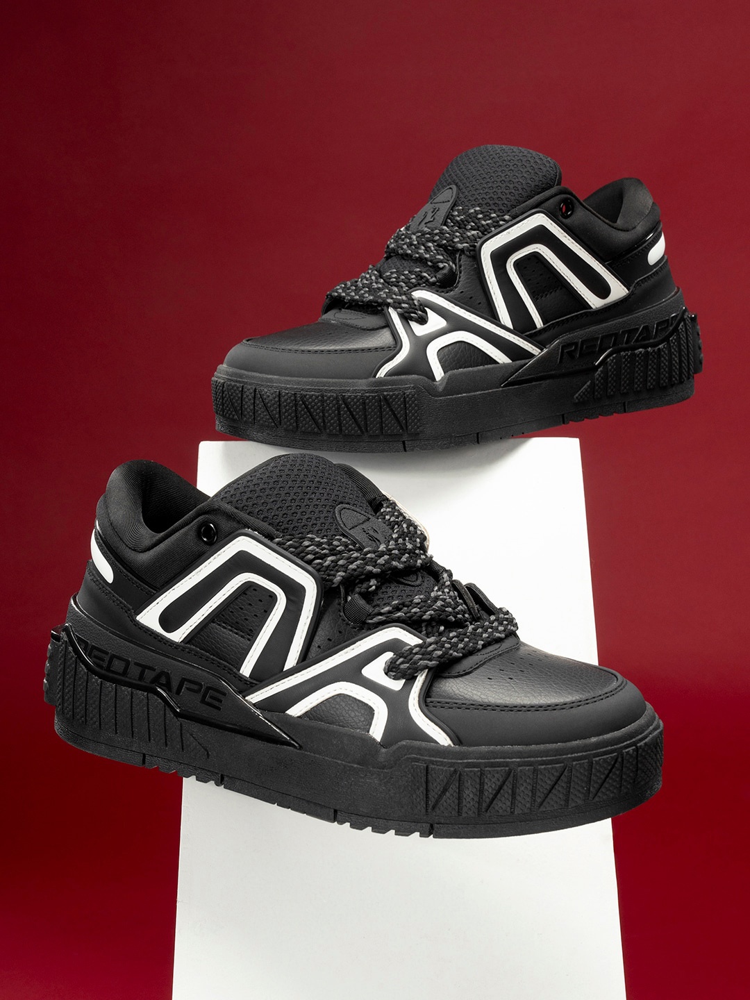 

Red Tape Men Textured Round Toe Memory Foam Sneakers, Black