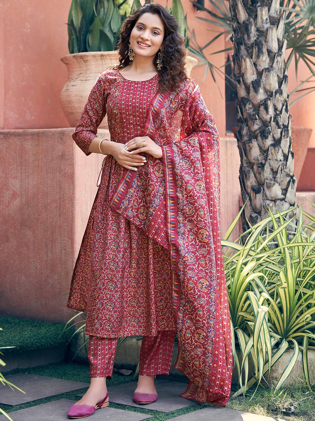 

Peachmode Floral Printed High Slit A-Line Chanderi Silk Kurta with Trousers & Dupatta, Maroon