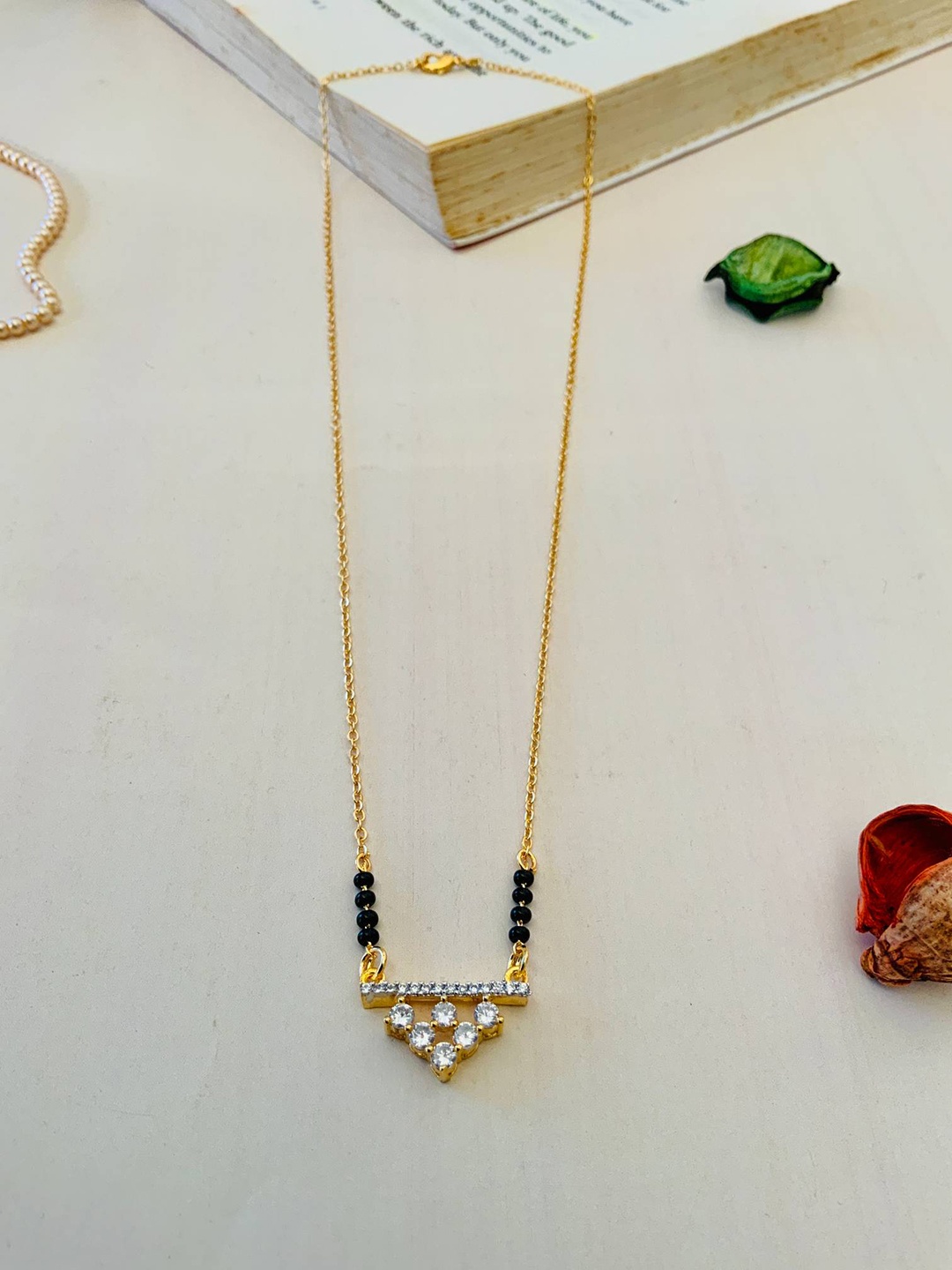 

ABDESIGNS Gold-Plated American Diamond Studded and Beaded Mangalsutra