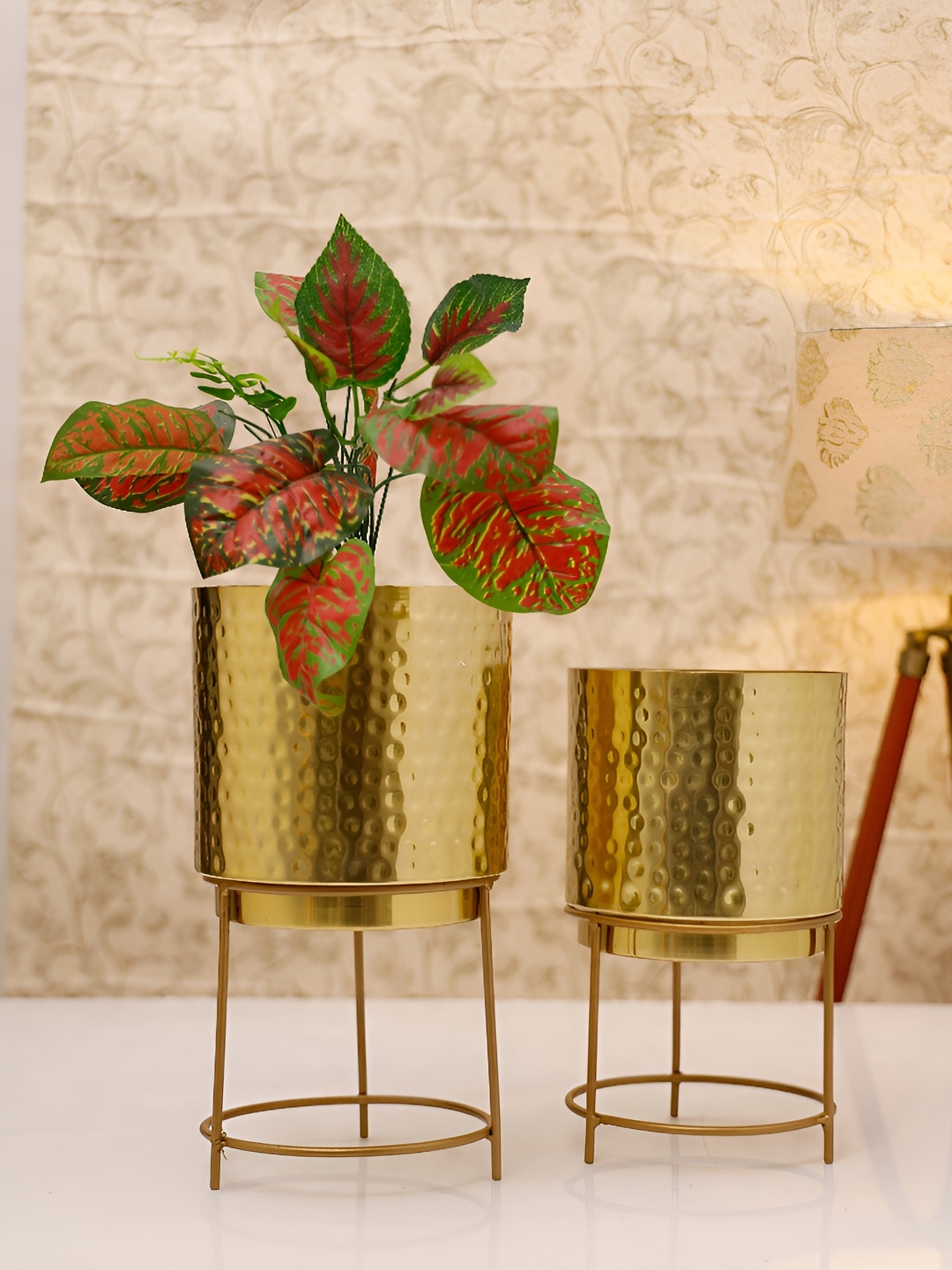 

HomeShastra Raagi Gold Toned 2 Pieces Textured Metal Planters With Stand