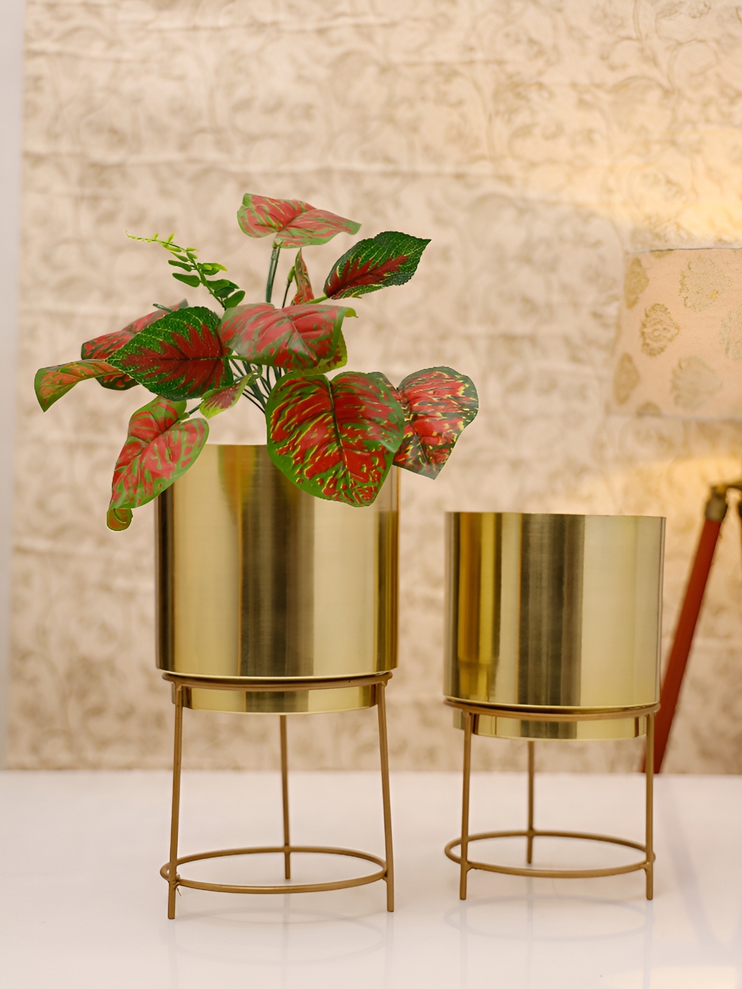 

HomeShastra Raggi Gold Toned 2 Pieces Glossy Metal Planter With Holder
