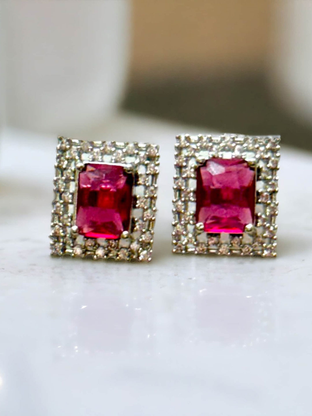 

The Pari Rhodium-Plated American Diamond-Studded Stud Earrings, Silver
