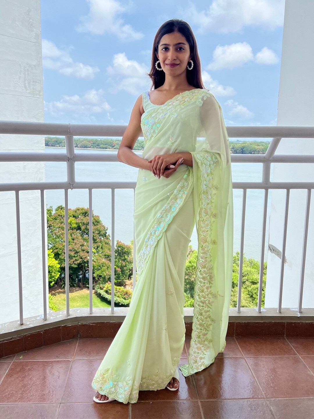 

Kalista Floral Embroidered Sequined Pure Georgette Saree, Green