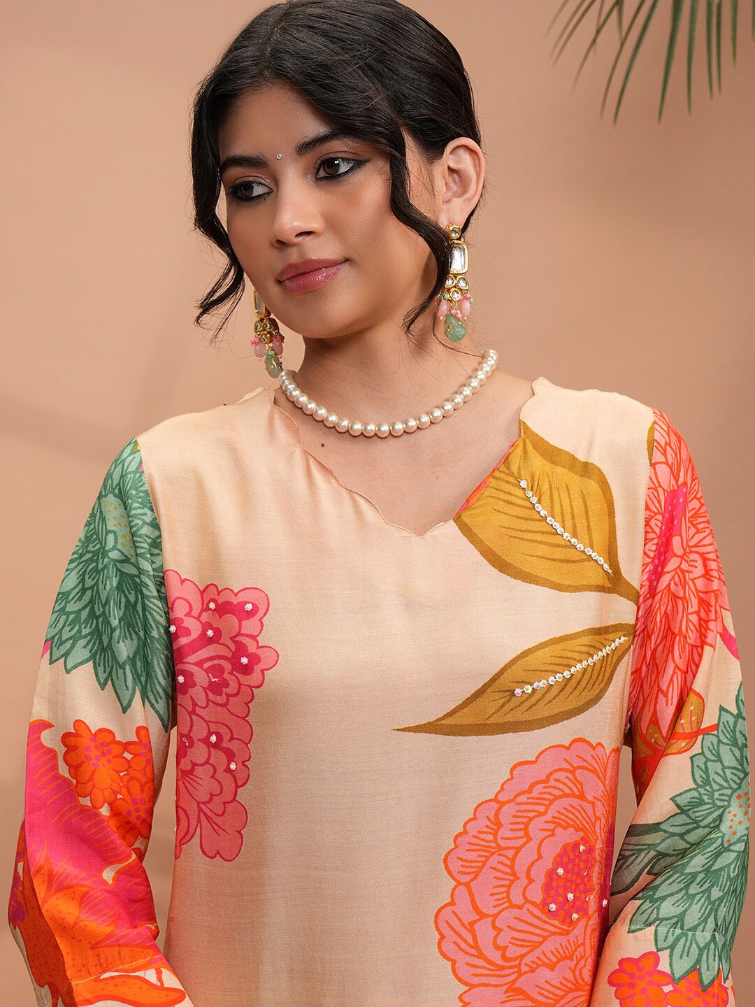 

Vishudh Beige Floral Printed Regular Beads and Stones Pure Cotton Kurta With Trousers