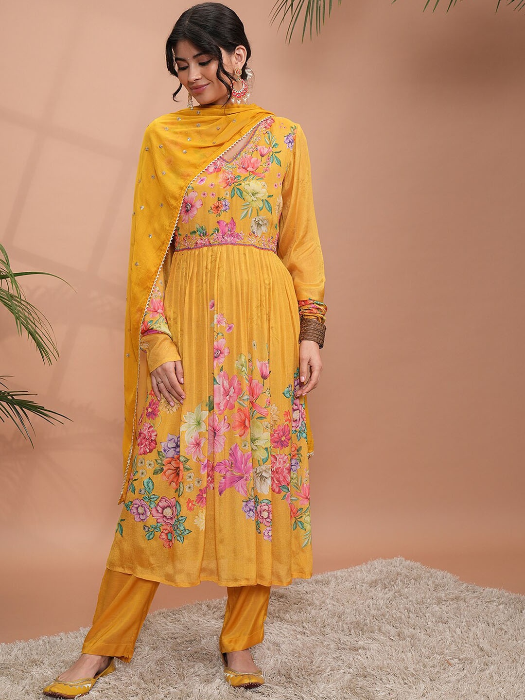 

Vishudh Mustard Yellow Floral Printed Beads and Stones Kurta With Trousers & Dupatta