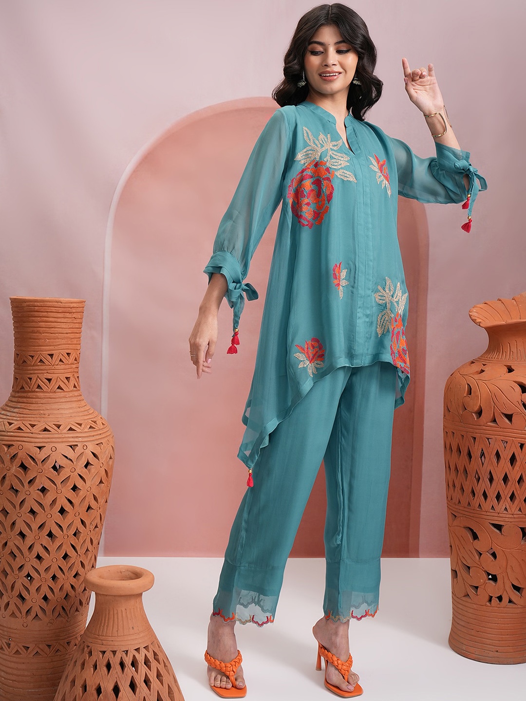 

Vishudh Blue Floral Embroidered V-Neck Kurta with Palazzos