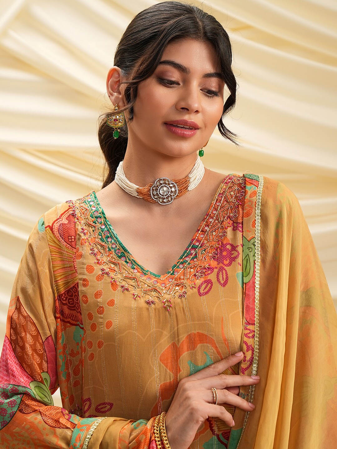 

Vishudh Floral Printed V-Neck Thread Work Kurta With Palazzos & Dupatta, Mustard