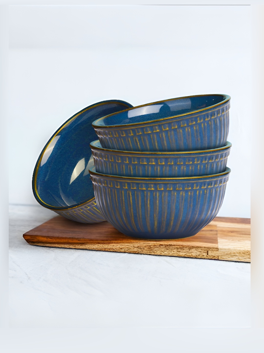 

The Earth Store Blue & Gold-Toned 4 Pieces Textured Ceramic Glossy Bowls 500 ml