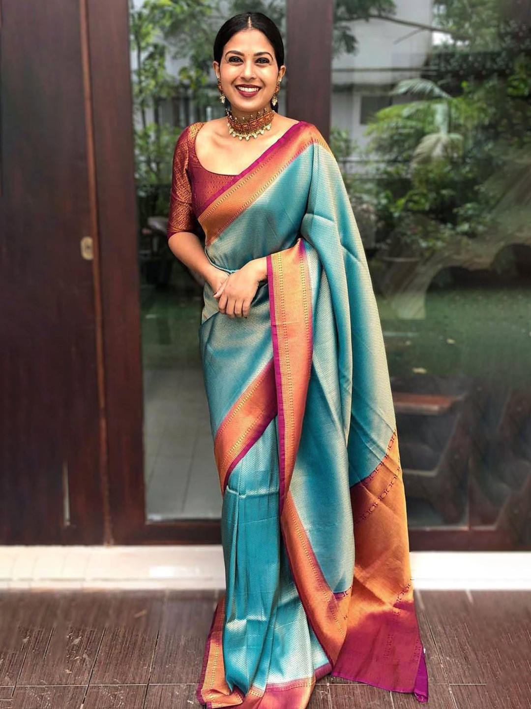 

KALINI Woven Design Zari Saree, Blue