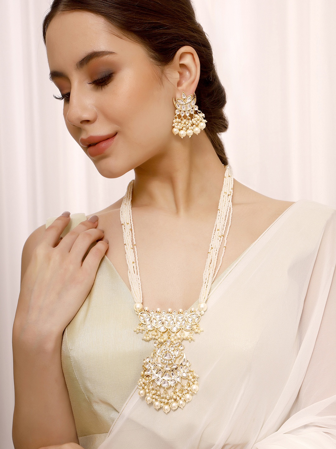 

Priyaasi Gold-Plated Kundan Studded & Beads Beaded Necklace With Earrings