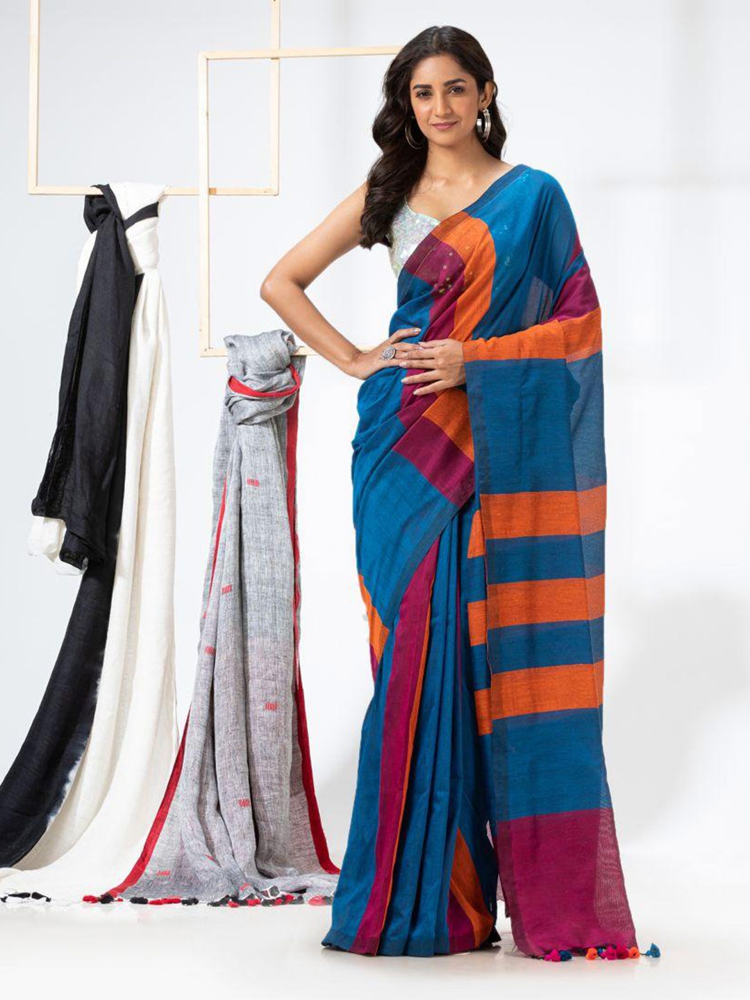 

Angoshobha Colourblocked Woven Design Pure Cotton Saree, Blue