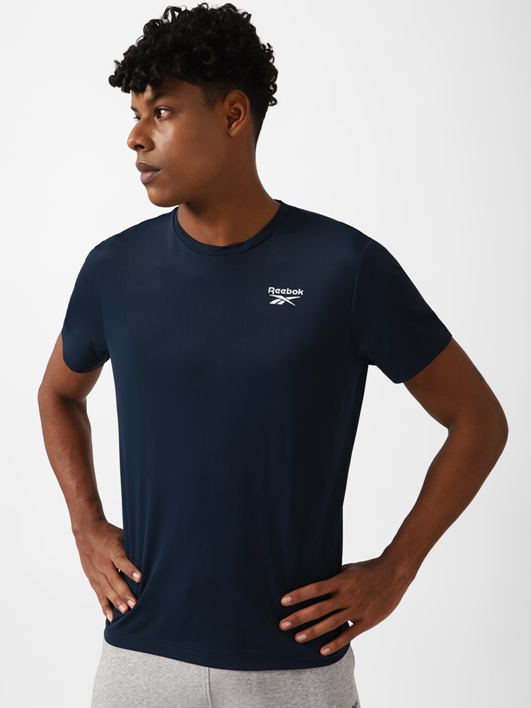 

Reebok Freedomstretch Slim Fit Round Neck T-shirt, Navy blue
