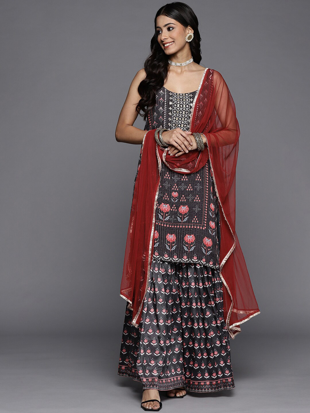 

KALINI Floral Printed Sequinned Sleeveless Kurta with Sharara & Dupatta, Black
