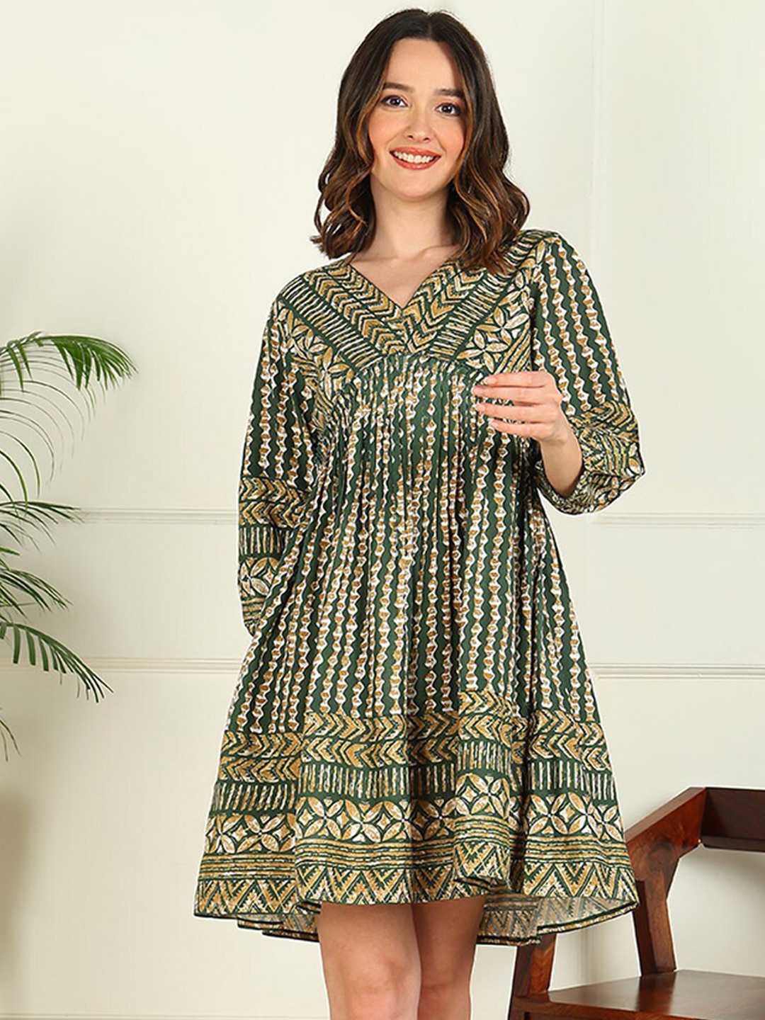 

mokshi Green Ethnic Motifs Printed V-Neck Gathered Detailed Empire Dress