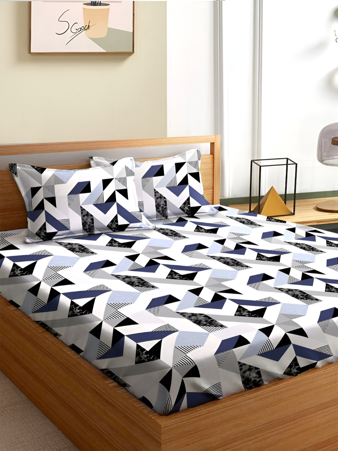 

Aura Blue & White Geometric 180 TC Queen Bedsheet With 2 Pillow Covers