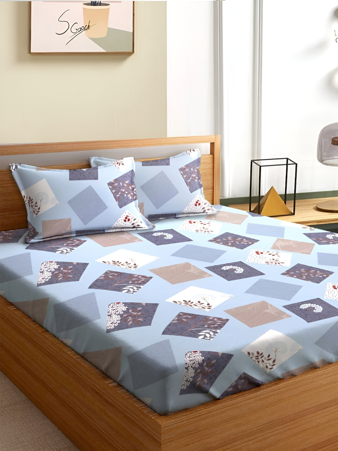 

Aura Blue & White Geometric 180 TC Queen Bedsheet With 2 Pillow Covers